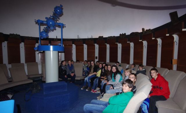 A group of students in the Planetarium at the Technical Museum in Kosice. Photo Credit: Martin George