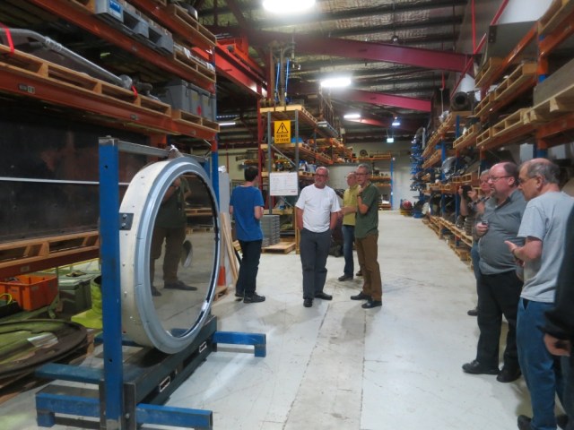 APS members inspecting the mirror from the GMT